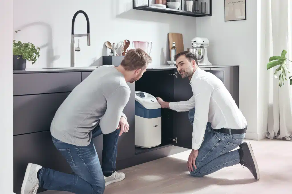 Water softener system being installed in a Northern Indianapolis home